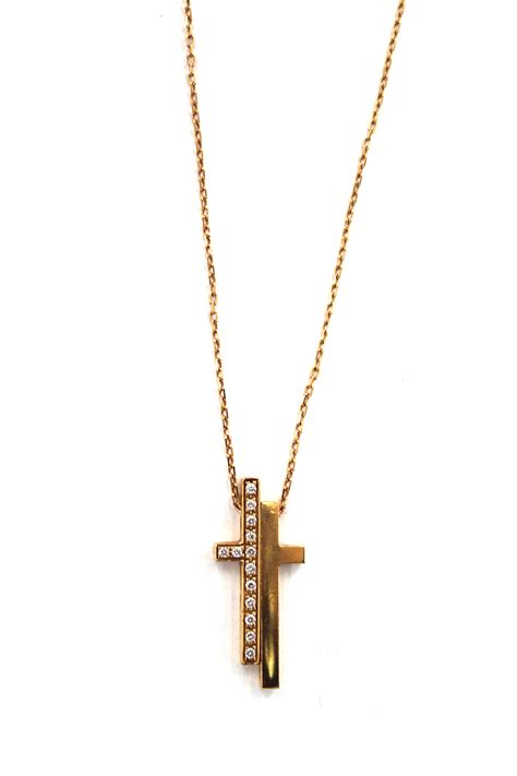 gucci diamond split cross necklace.